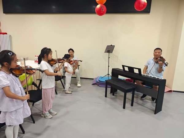 田园交响青少年公益乐团： 开学第一课的前方报道